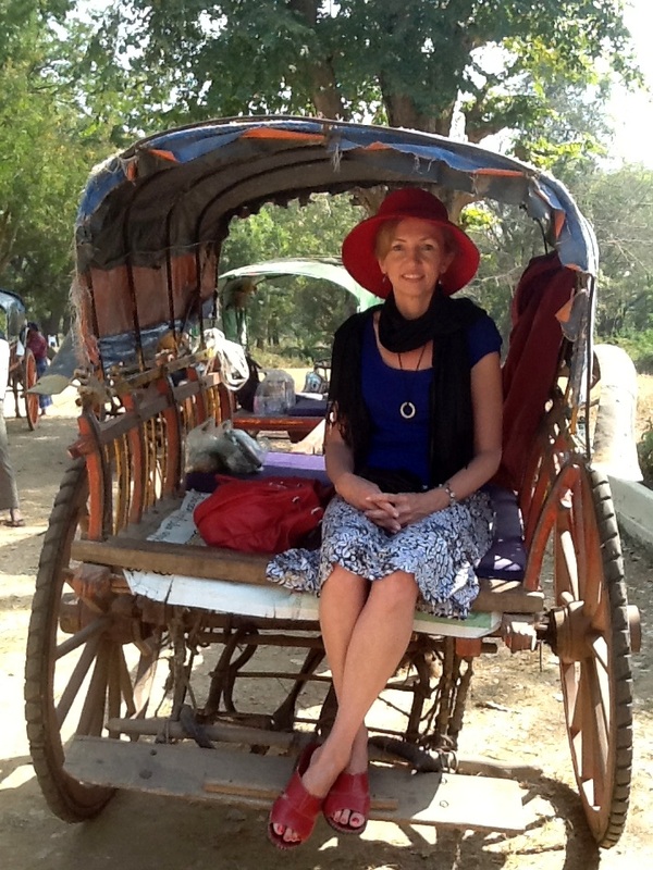 Picture of Tracey-Ann Palmer on the back of a donkey cart in Myanmar
